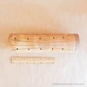 Natural cylindrical music shaker (22.5x6.5cm), a versatile percussion instrument.