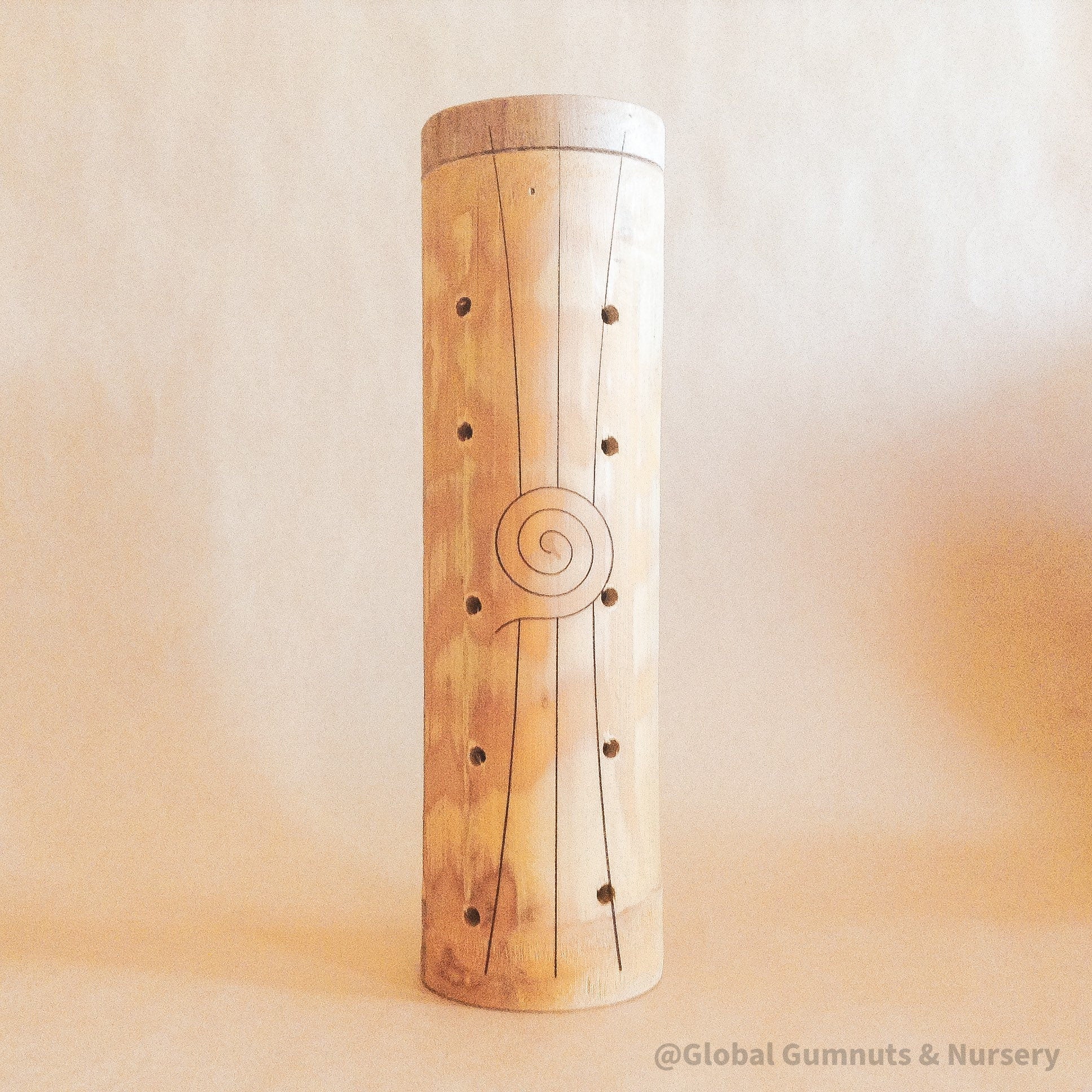 Natural cylindrical music shaker (22.5x6.5cm), a versatile percussion instrument.