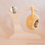 Natural Wooden Beehive Crochet Tree: A wooden crochet tree resembling a beehive, perfect for decor, crafts, or children’s creative play.