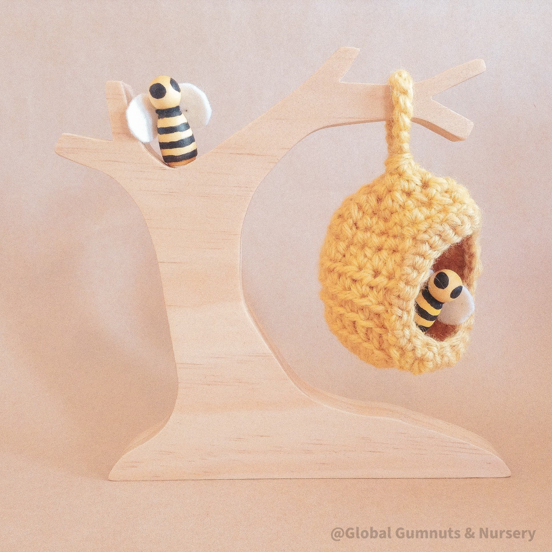 Natural Wooden Beehive Crochet Tree: A wooden crochet tree resembling a beehive, perfect for decor, crafts, or children’s creative play.