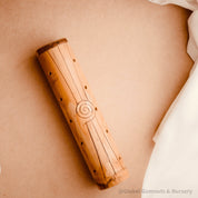 Natural cylindrical music shaker (22.5x6.5cm), a versatile percussion instrument.