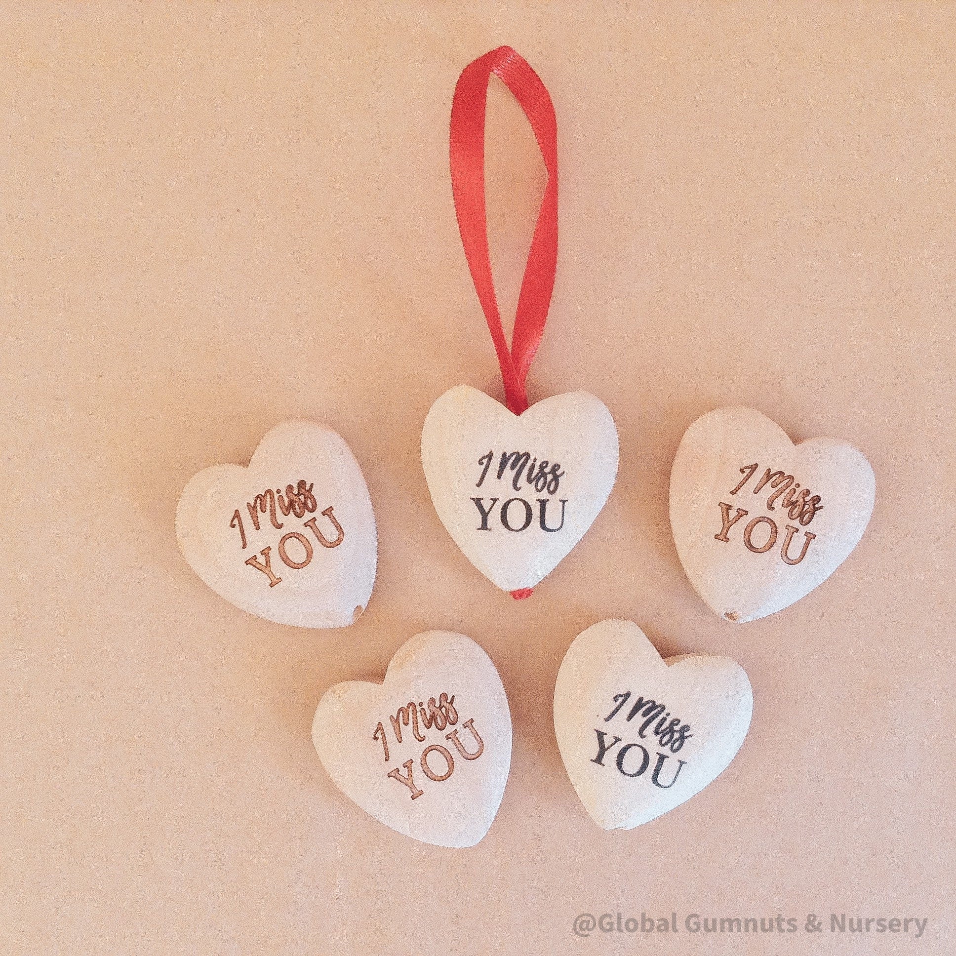 Gift a wooden heart with "I Miss You" sentiment, a thoughtful keepsake to send love and warm wishes.