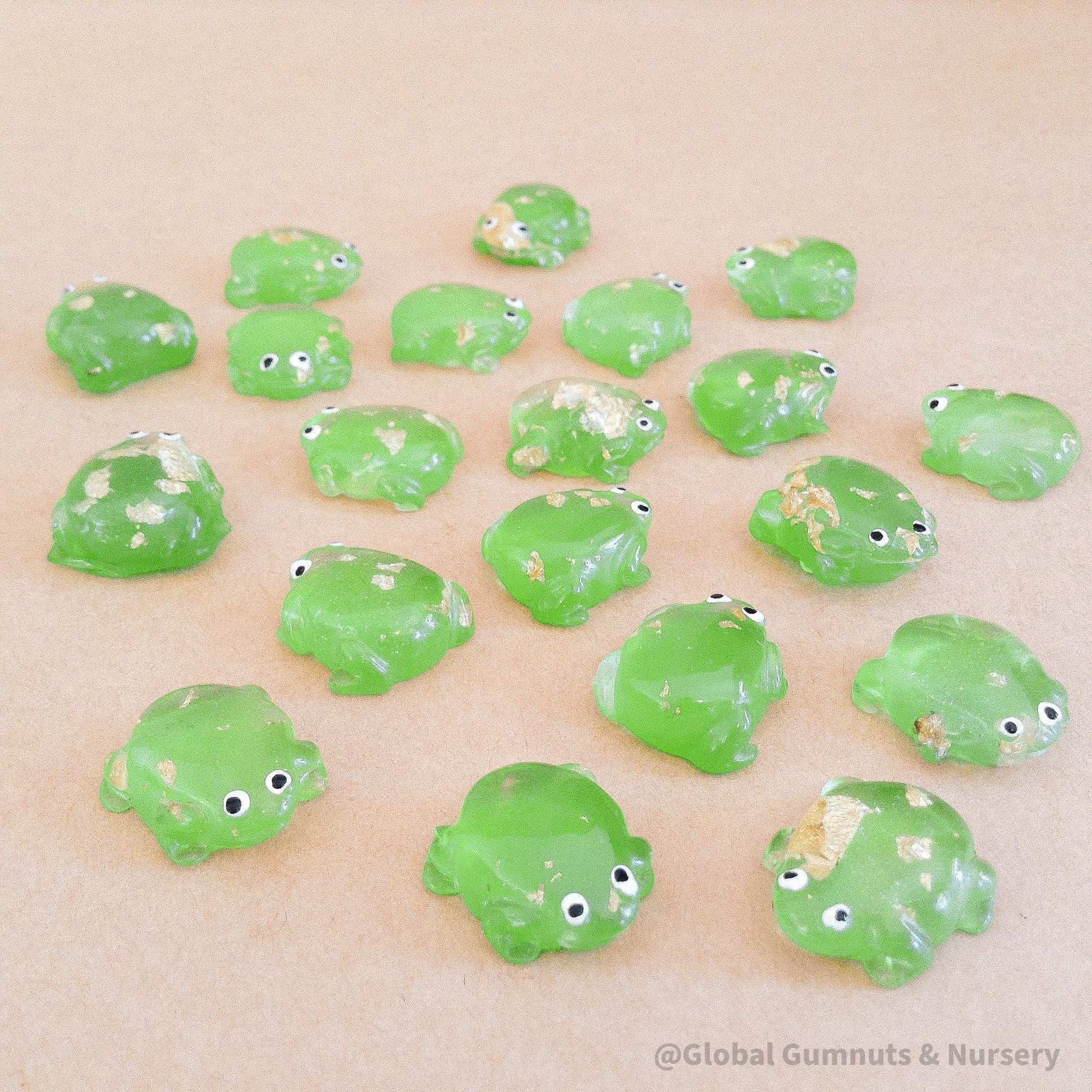gold sparkle resin frogs: sparkly resin frogs for fairy garden setups and miniature decorations.