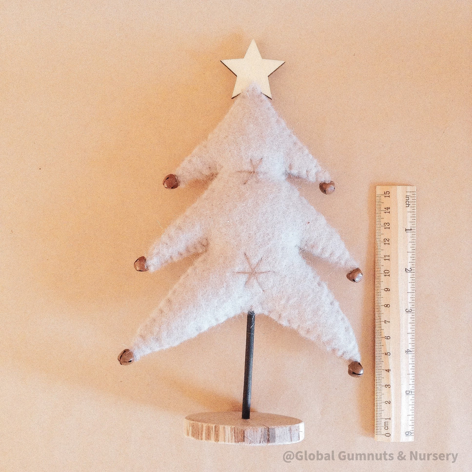elegant grey woolen christmas trees: set of grey wool felt christmas trees adorned with small jingle bells, perfect for festive decor.