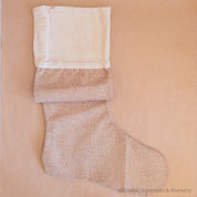 Personalized farmhouse Christmas stocking in jute linen, a rustic holiday charm.