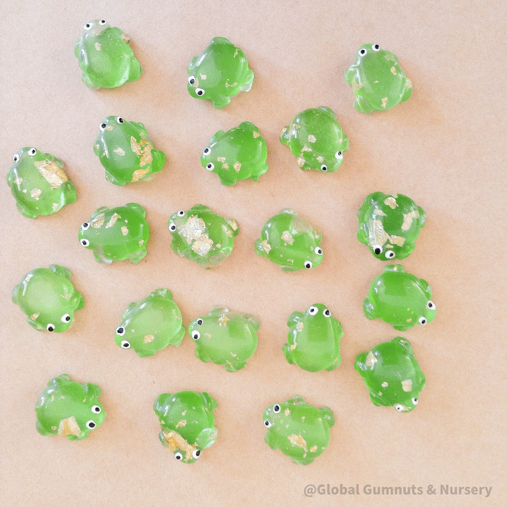 Gold Sparkle Resin Frogs: Sparkly resin frogs for fairy garden setups and miniature decorations.