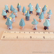 mini green tree fairy house figurines: whimsical resin treehouse figures for fairy gardens.