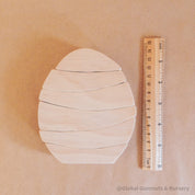 Natural wooden egg stacker, perfect for creative play or Montessori learning.