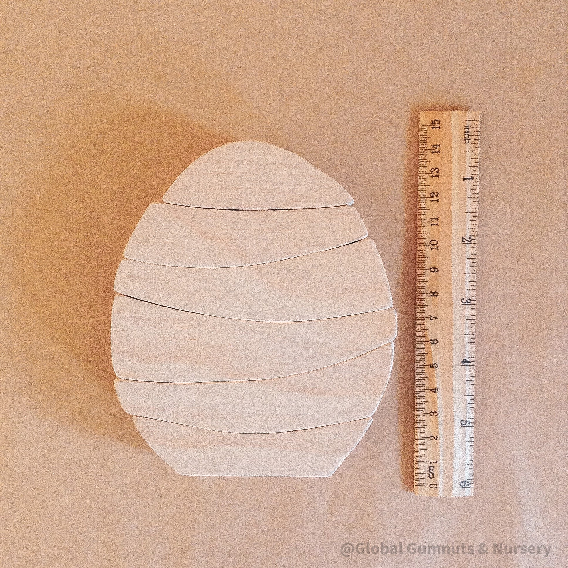 Natural wooden egg stacker, perfect for creative play or Montessori learning.