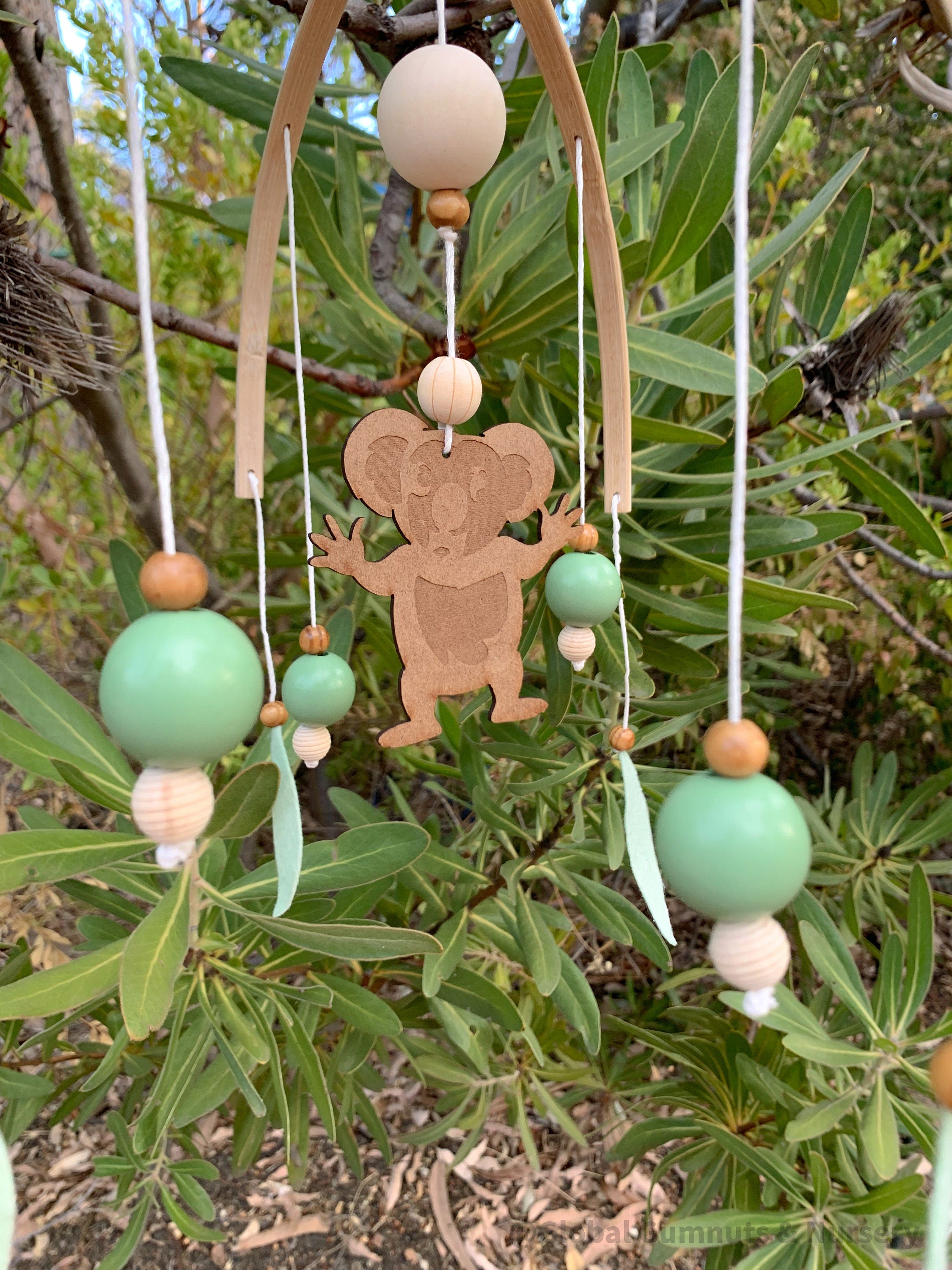Koala Baby Mobile: Felt and wood nursery mobile featuring a koala.