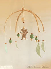 Koala Baby Mobile: Felt and wood nursery mobile featuring a koala.