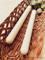 Rounded Wooden Rolling Pin: Rounded-end rolling pin for sensory play and crafts.