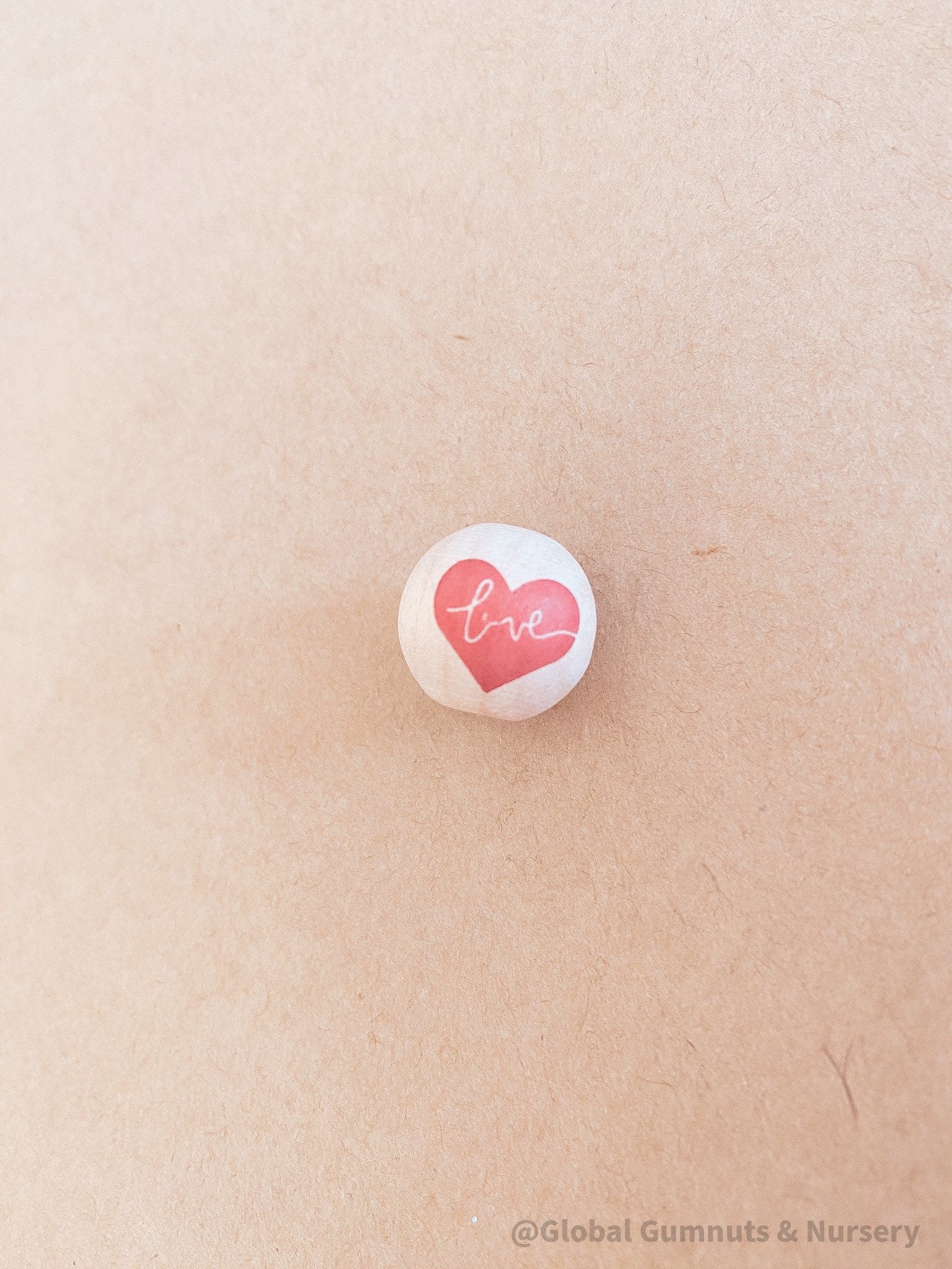 wooden love red heart beads: beautiful wooden beads with drilled holes in the shape of red hearts, perfect for diy craft projects and jewellery.