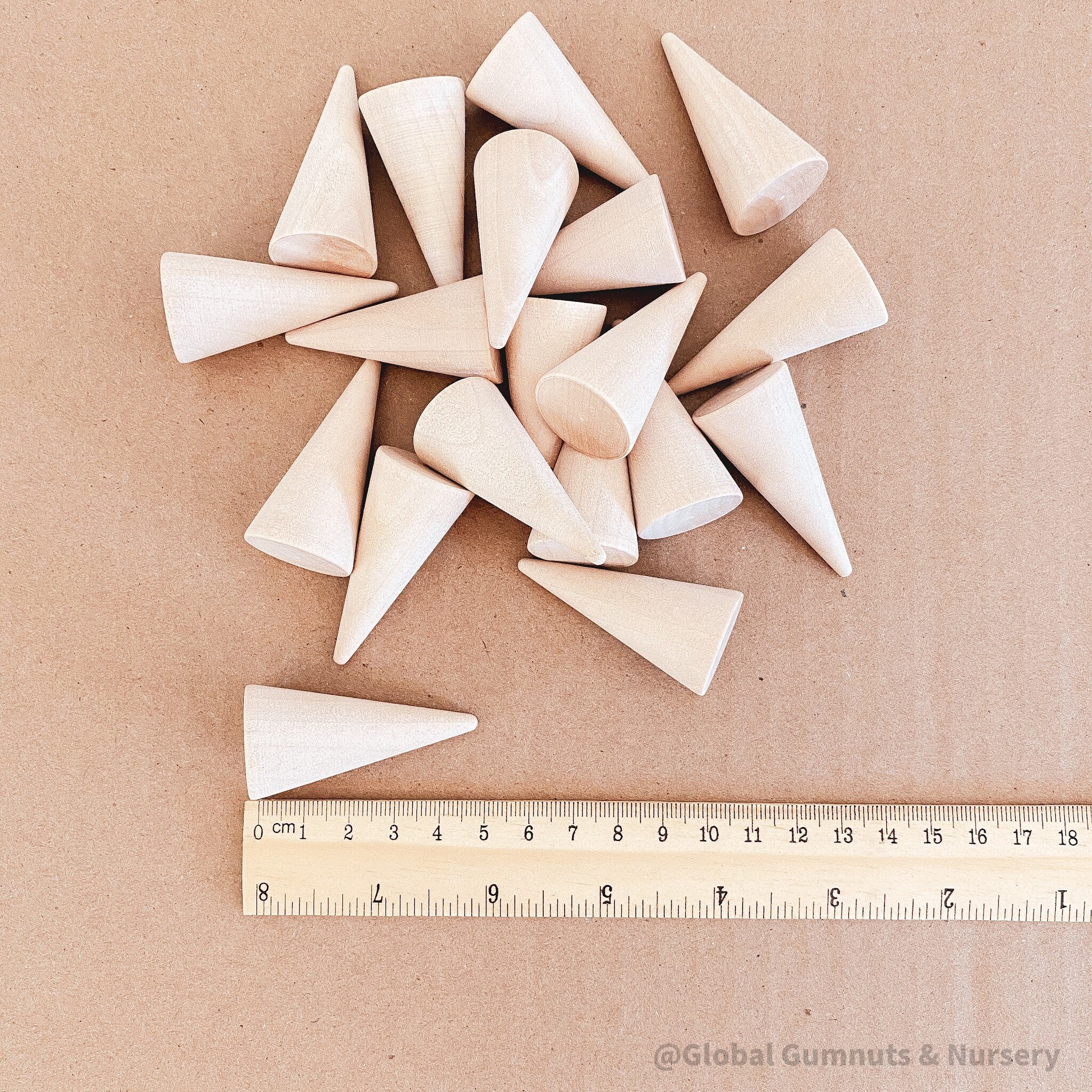 Natural mini wooden forest, featuring raw wooden Christmas trees for holiday crafts or decor.