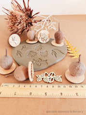 Native Walk Set Gumnut Nature Stamps: Nature-themed stamp set with floral and bush motifs.