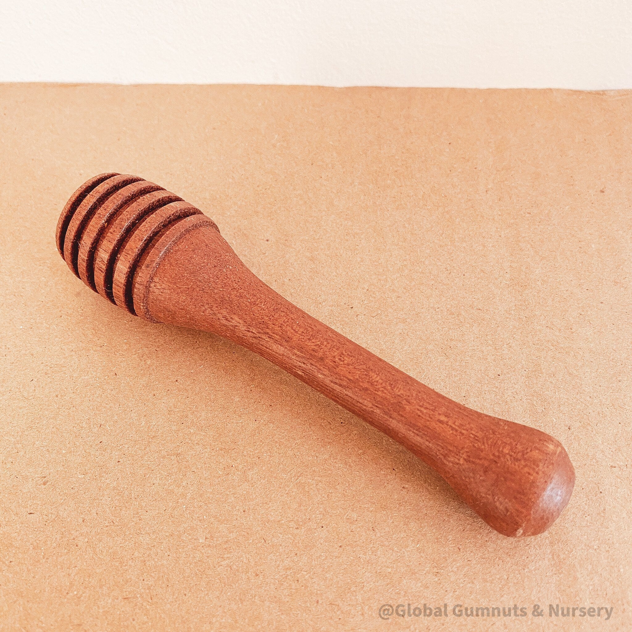 Oval Honey Spoon – Stick 12cm: Wooden honey spoon with a 12cm stick, great for scooping honey or adding rustic charm to kitchens.