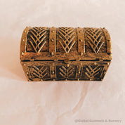 Golden plastic treasure chest, perfect for sparking kids' imaginations or treasure-themed adventures.