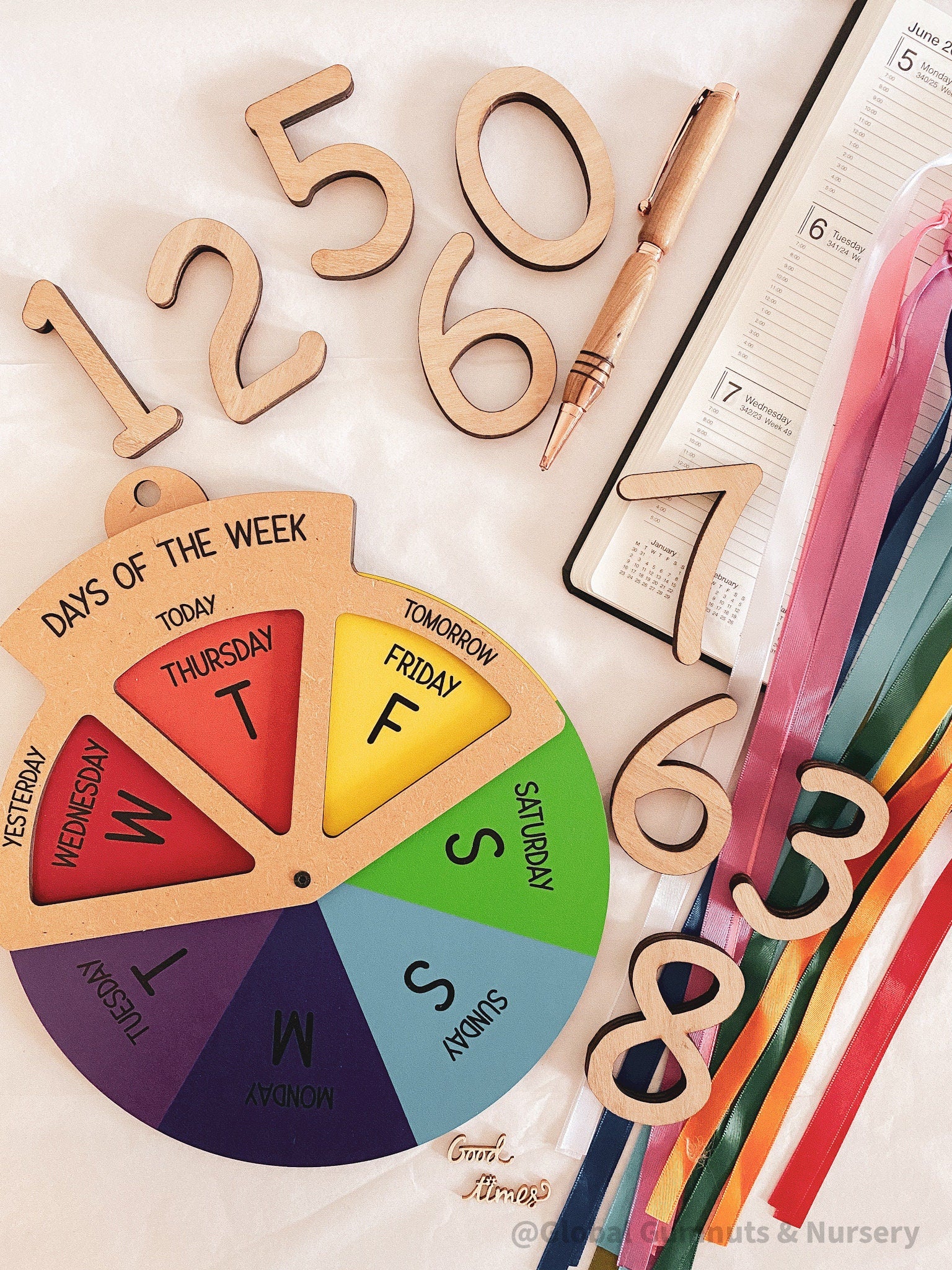 Days of the Week Wheel: Educational MDF round wheel with three-way viewer to display the days of the week; features a spinner for easy use.
