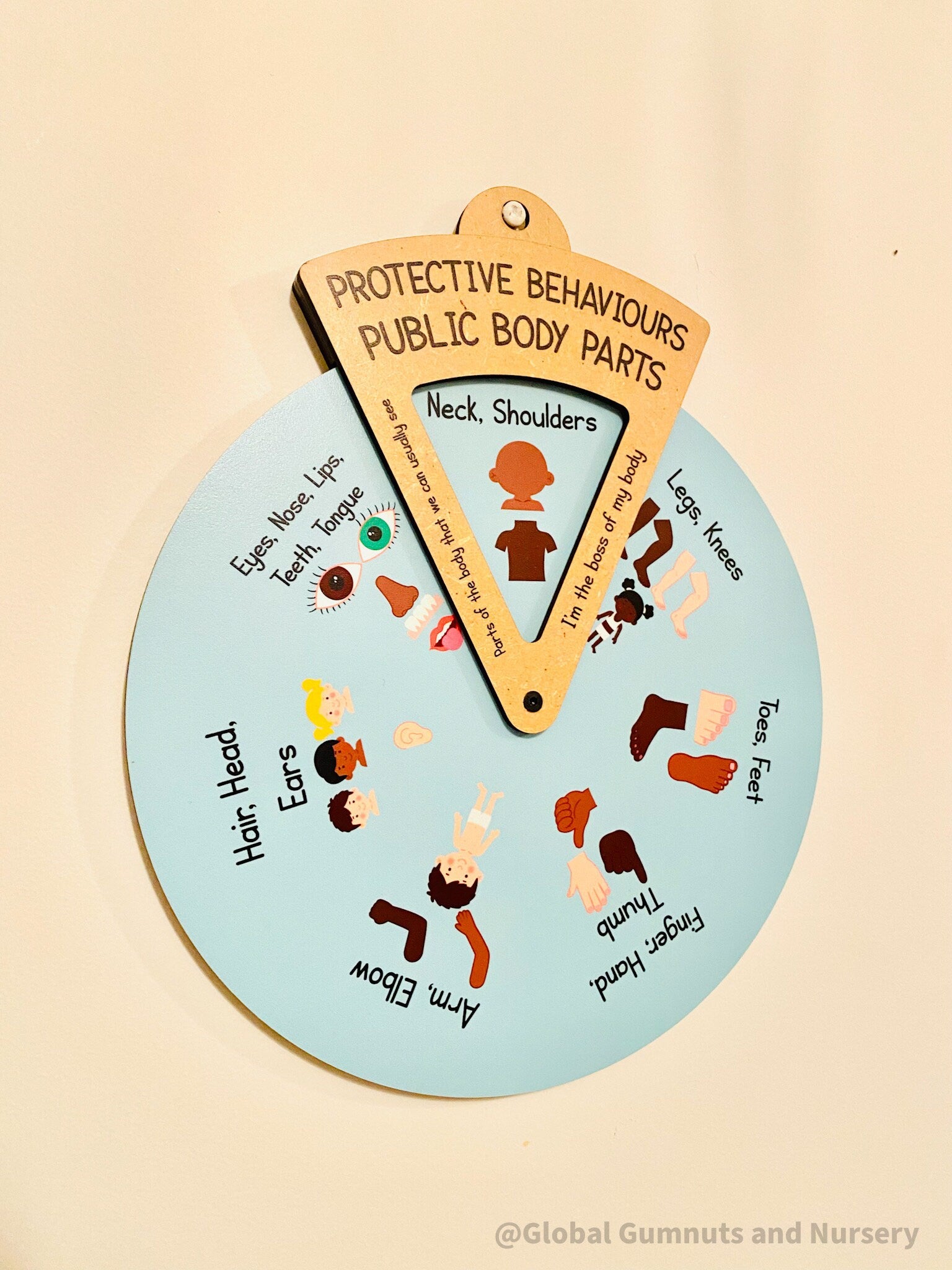 Interactive Protective Behaviours Spinner Dial: Educational wooden spinner with viewer window, teaching kids about personal body safety.