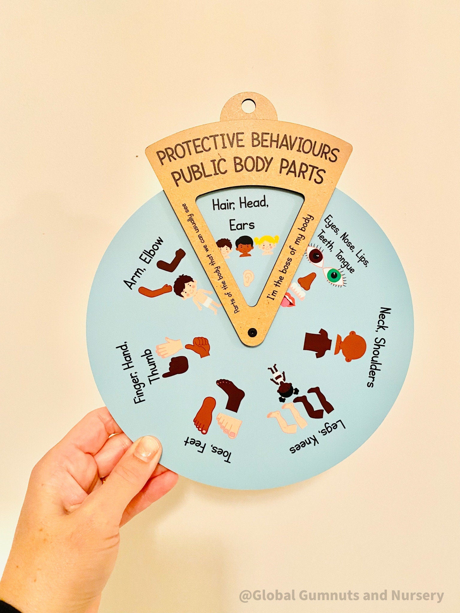 Interactive Protective Behaviours Spinner Dial: Educational wooden spinner with viewer window, teaching kids about personal body safety.