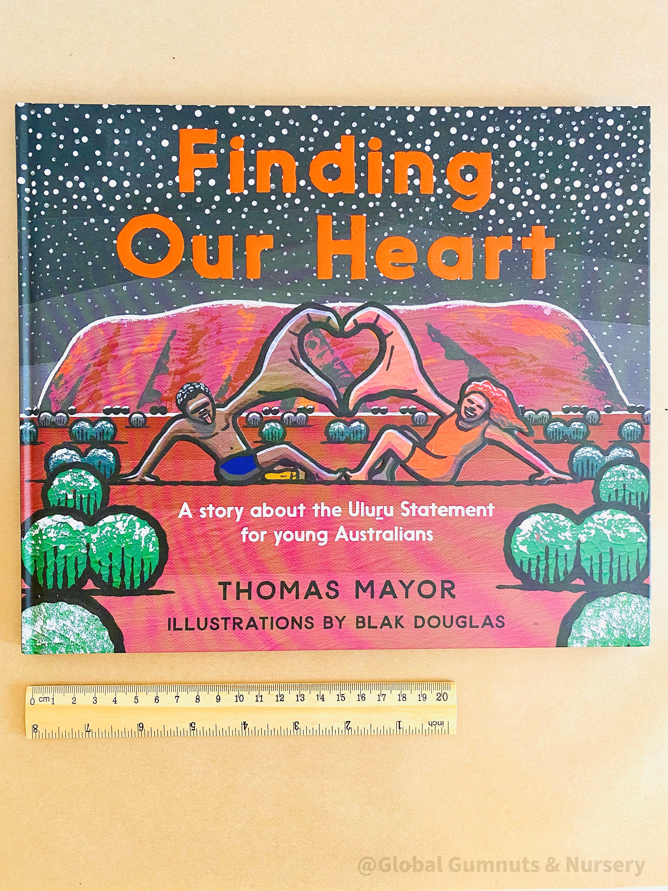 "Finding Our Heart" by Thomas Mayor, an Indigenous storytelling book paired with a wooden heart keepsake.