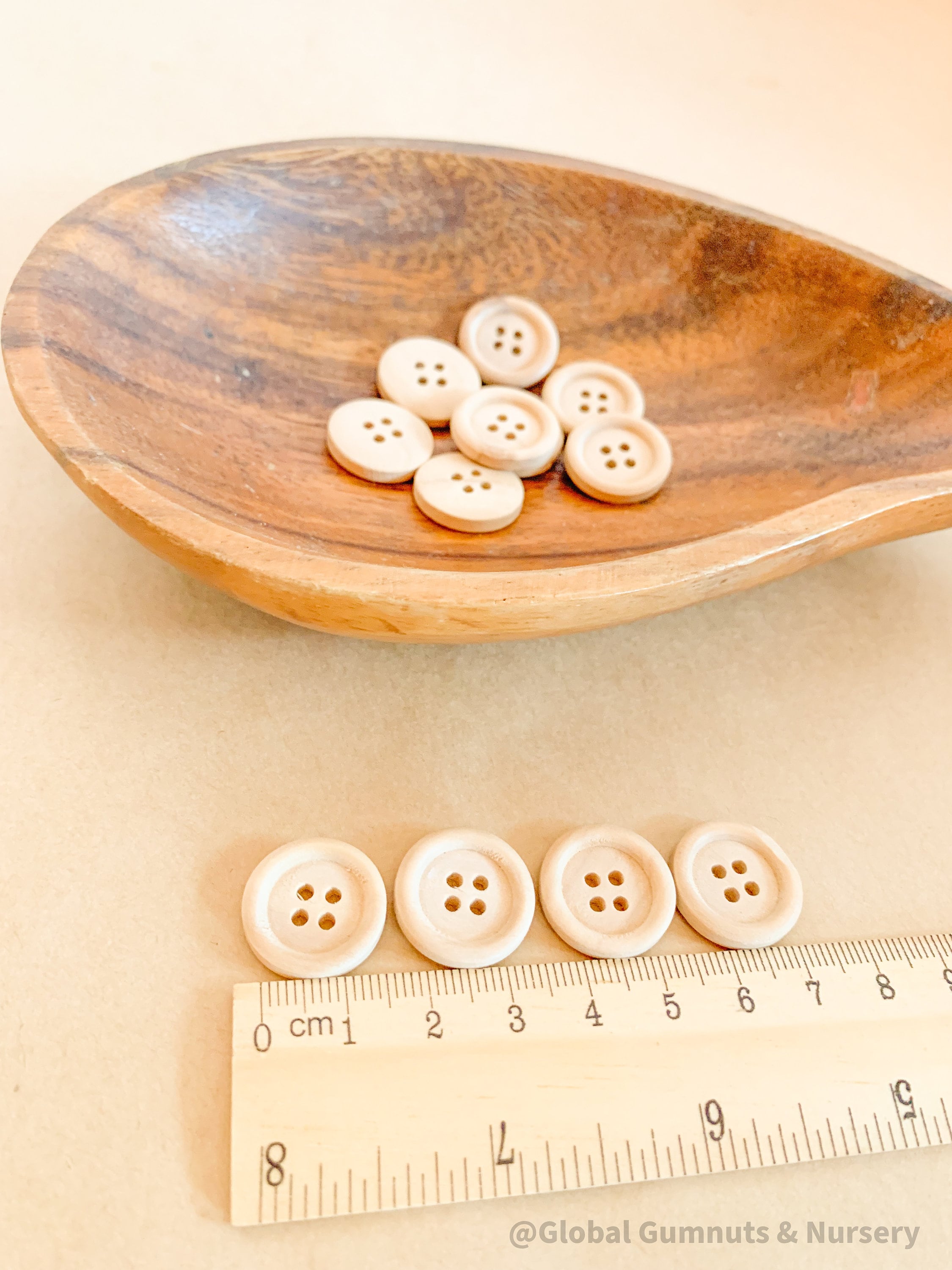 Natural Wooden Buttons: Raw wood buttons ideal for counting and sorting.
