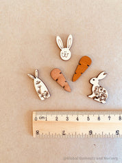 Easter Wooden Embellishments: Set of three bunnies and two carrots for Easter-themed crafts.