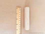 10cm Rolling Pin: Small wooden rolling pin for crafting and sensory activities.
