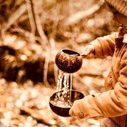Short handle sand or water scoop, a kid-friendly tool for mud kitchens or play.