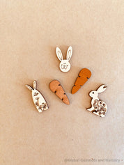 Easter Wooden Embellishments: Set of three bunnies and two carrots for Easter-themed crafts.