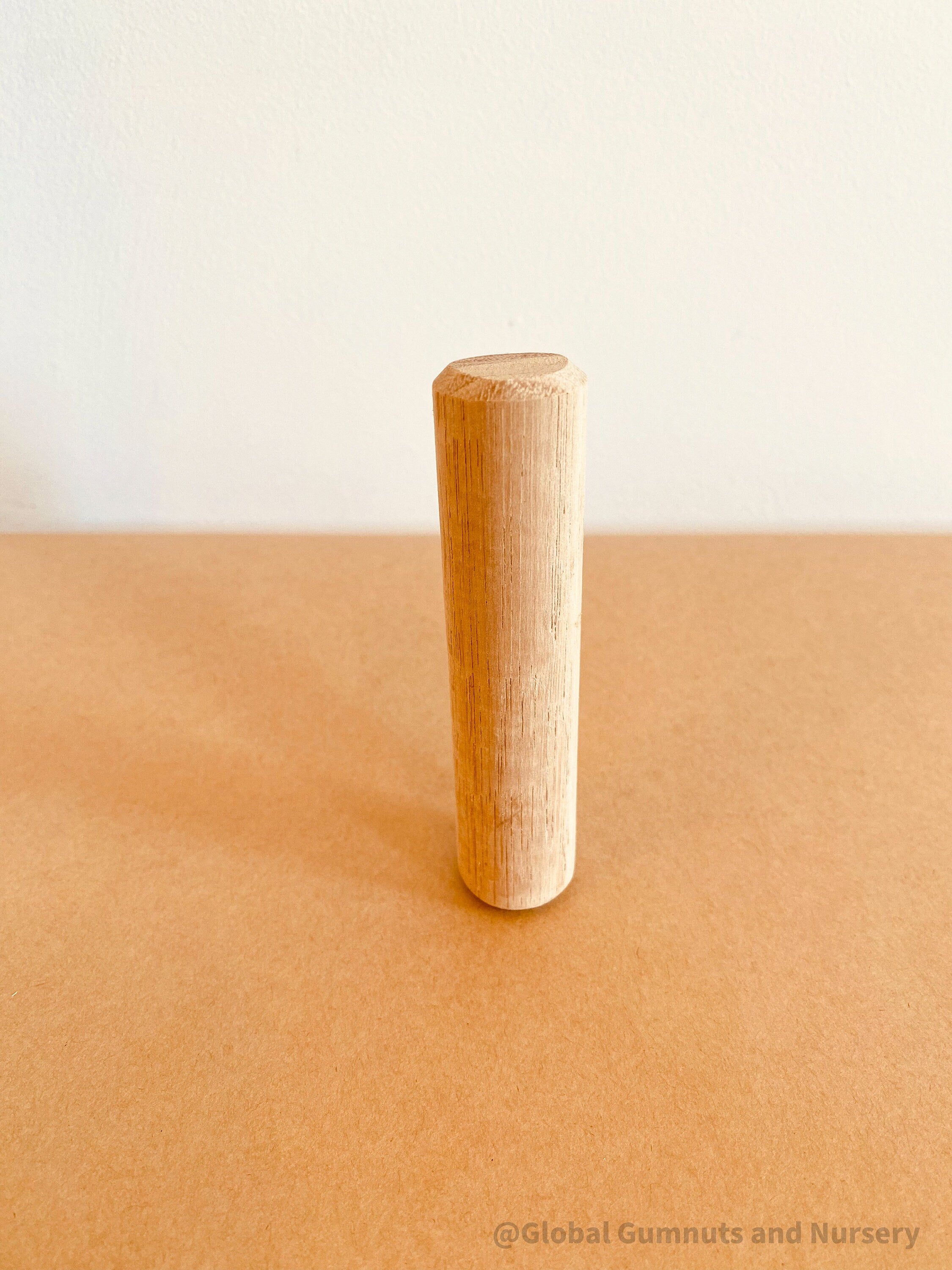 10cm Rolling Pin: Small wooden rolling pin for crafting and sensory activities.
