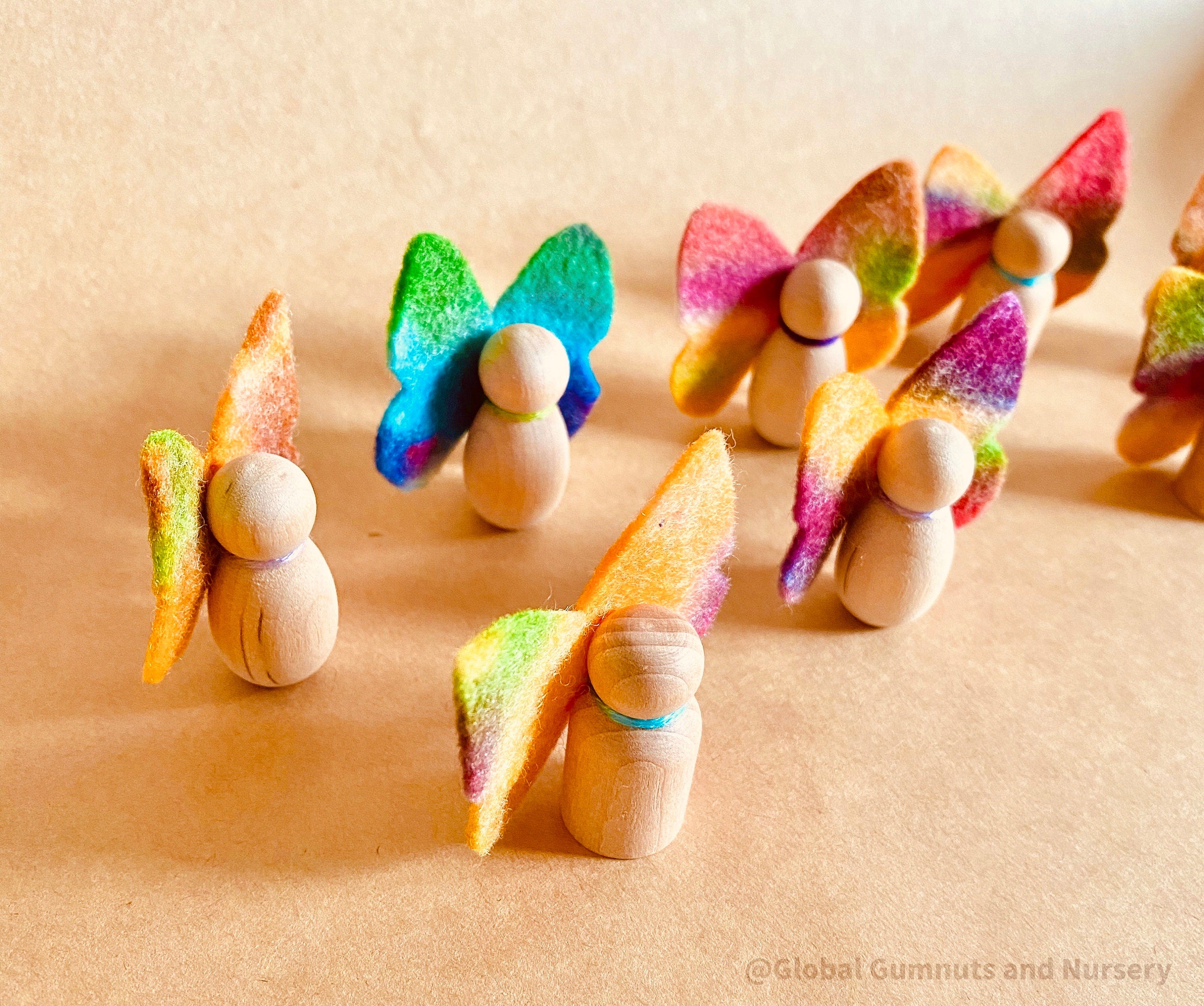 Wool felt butterflies, perfect for play, autumn crafts, or as pocket fairy friends with a wooden body.