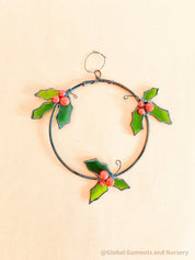 Stained Glass Wreath: Festive wreath with stained glass holly and berries.