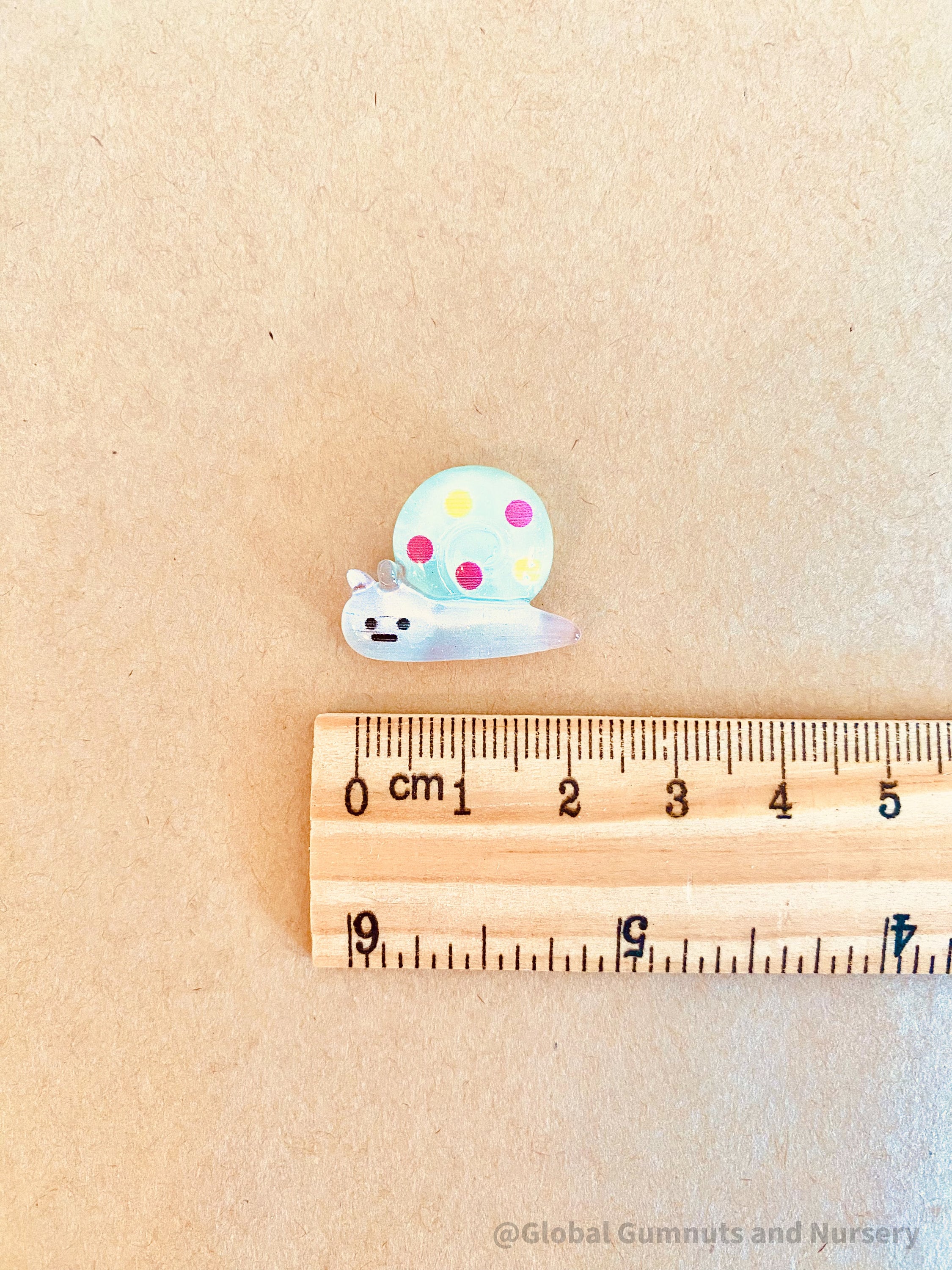 shimmer snail resins: small resin snail figures for crafts, play, or cake toppers.