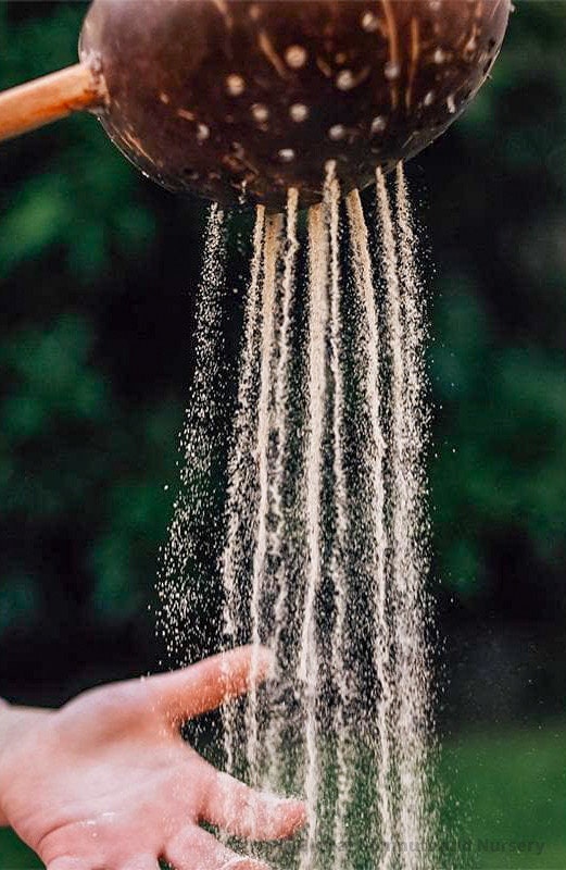 Short handle sand or water scoop, a kid-friendly tool for mud kitchens or play.