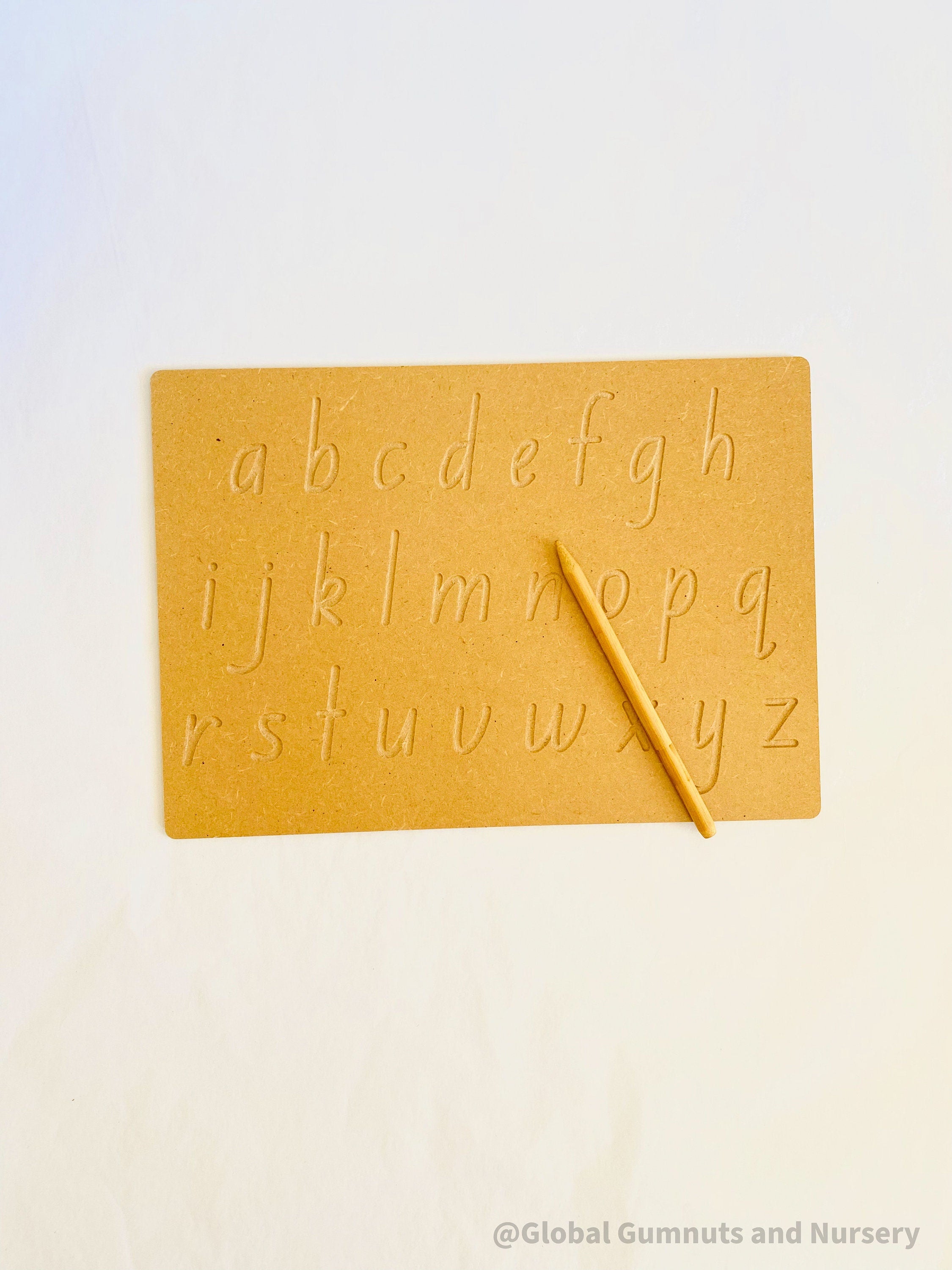 Lowercase Wooden Tracing Board: Board and stylus for letter tracing and writing practice.