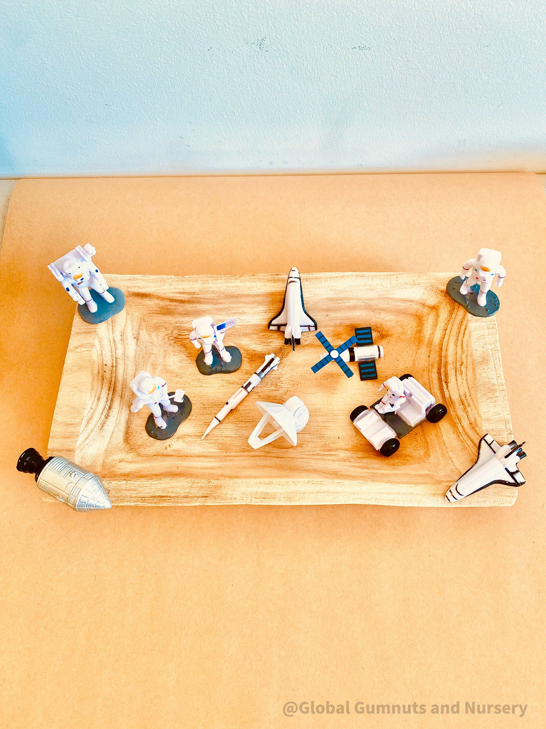 11-piece plastic space explorer figurine set with astronauts, rockets, and space vehicles. Inspires imaginative play and learning about the cosmos!