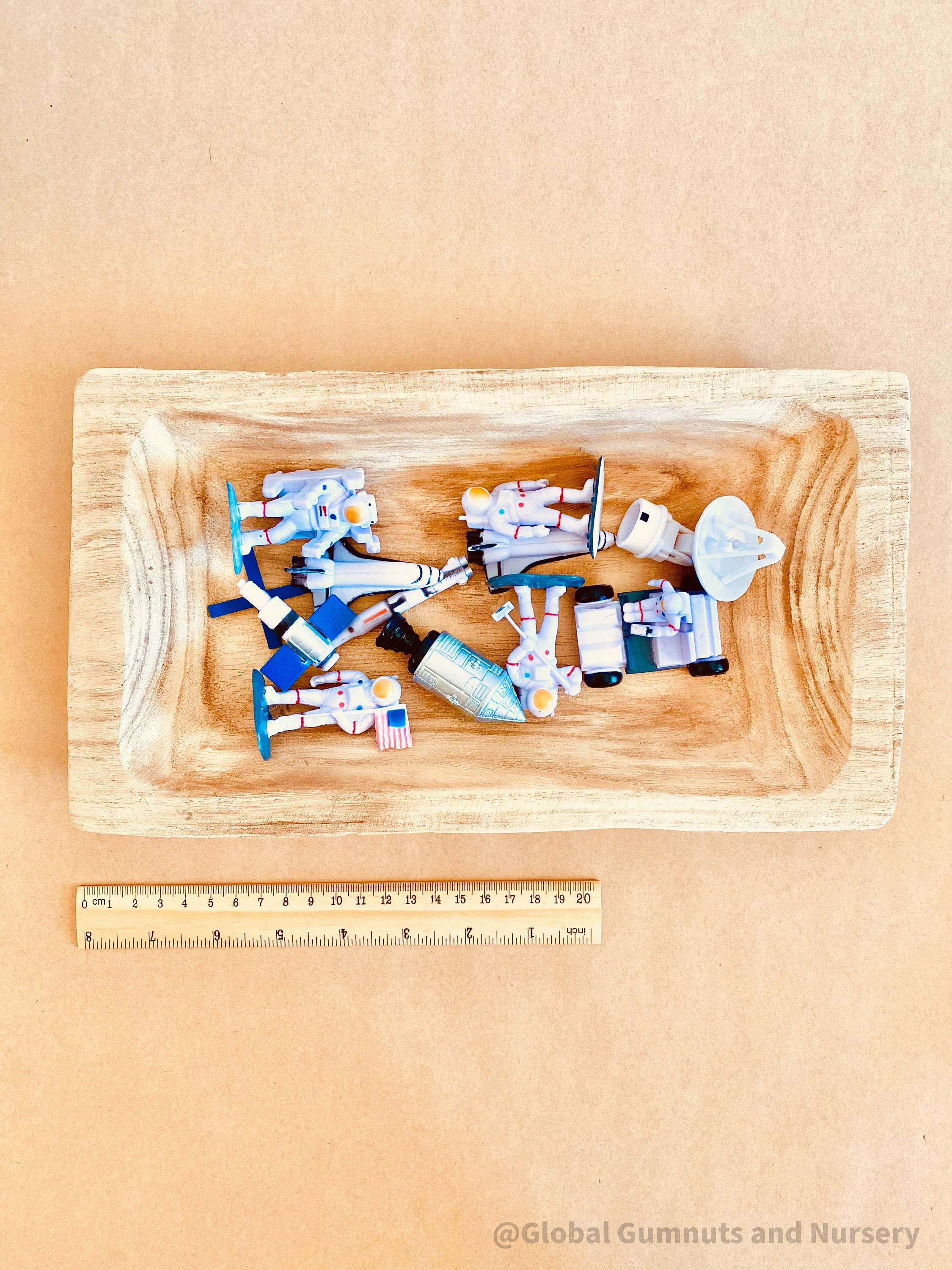 11-piece plastic space explorer figurine set with astronauts, rockets, and space vehicles. Inspires imaginative play and learning about the cosmos!