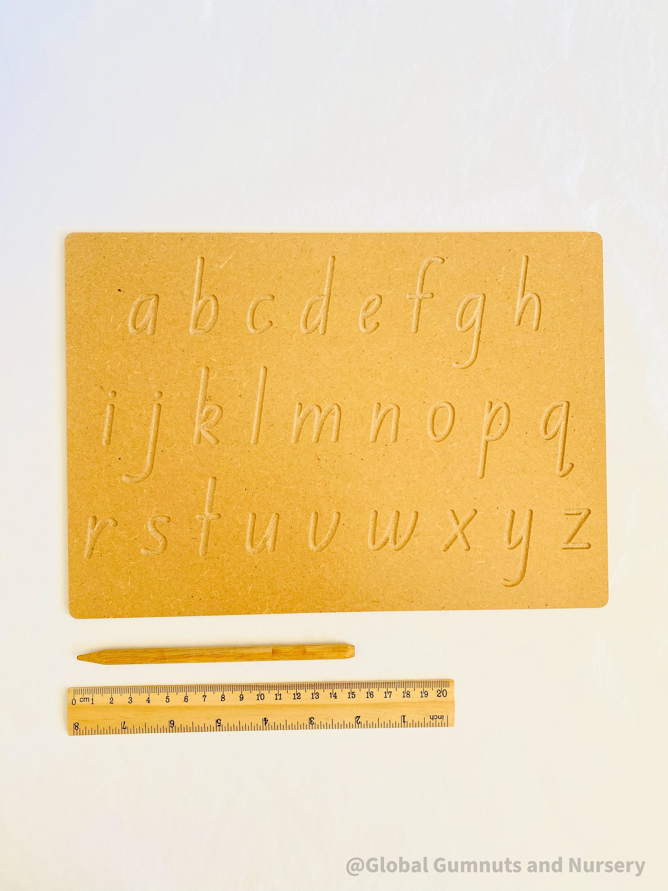 Lowercase Wooden Tracing Board: Board and stylus for letter tracing and writing practice.