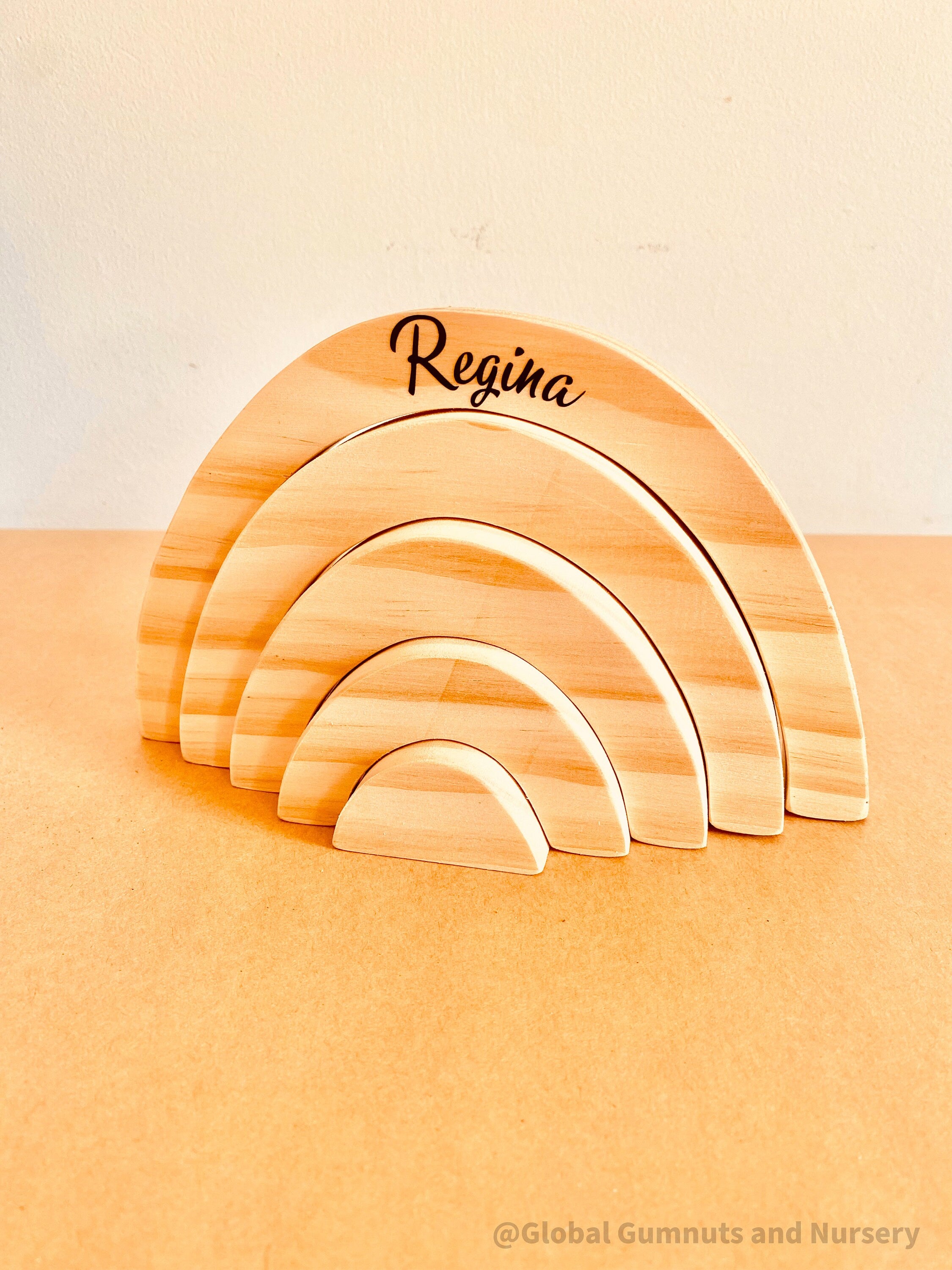 Rainbow Wooden Stacker: Eco-friendly handmade rainbow stacker for creative play.