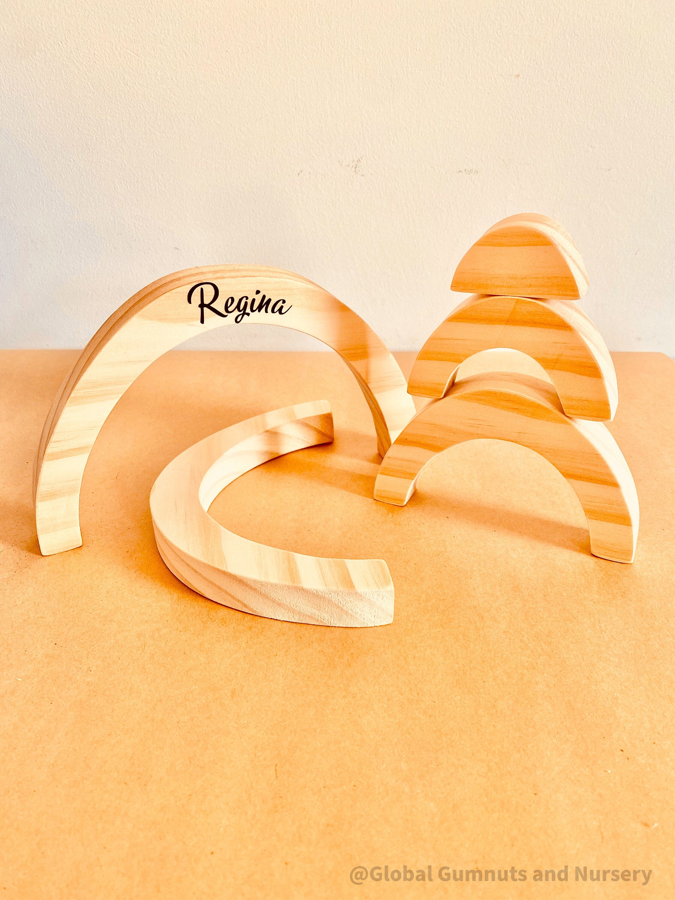 Rainbow Wooden Stacker: Eco-friendly handmade rainbow stacker for creative play.