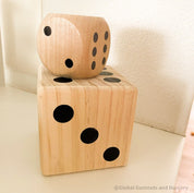 Oversized wooden dice, perfect for garden games, party entertainment, or creative displays.