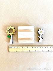 Mini Flower Display with Stand: Floral decor with a stand for small-world scenes and displays.