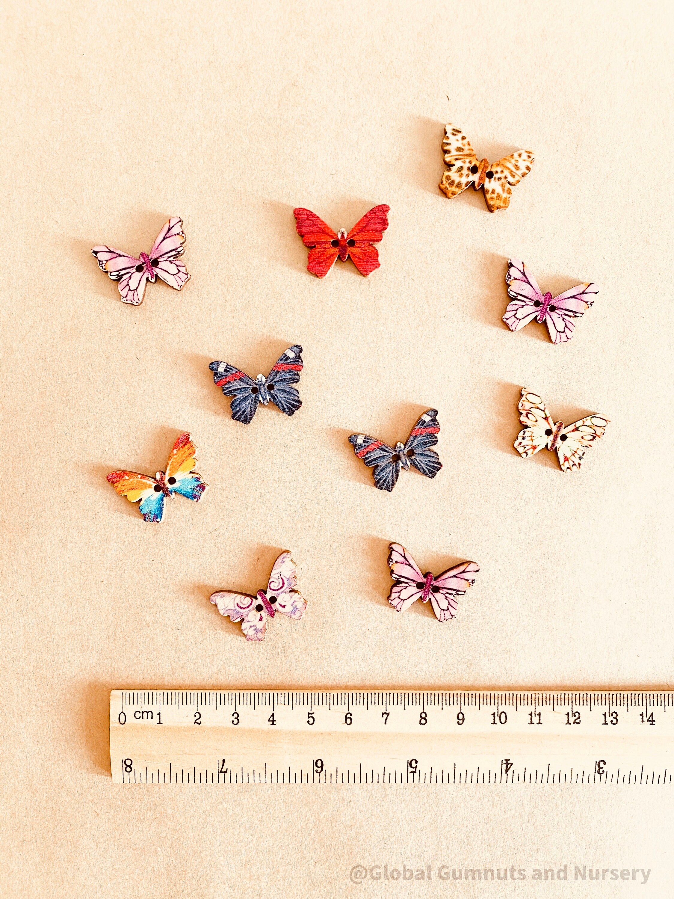 Set of 10 or 20 colorful wooden butterflies, perfect for crafts, decorations, or vibrant small-world play.