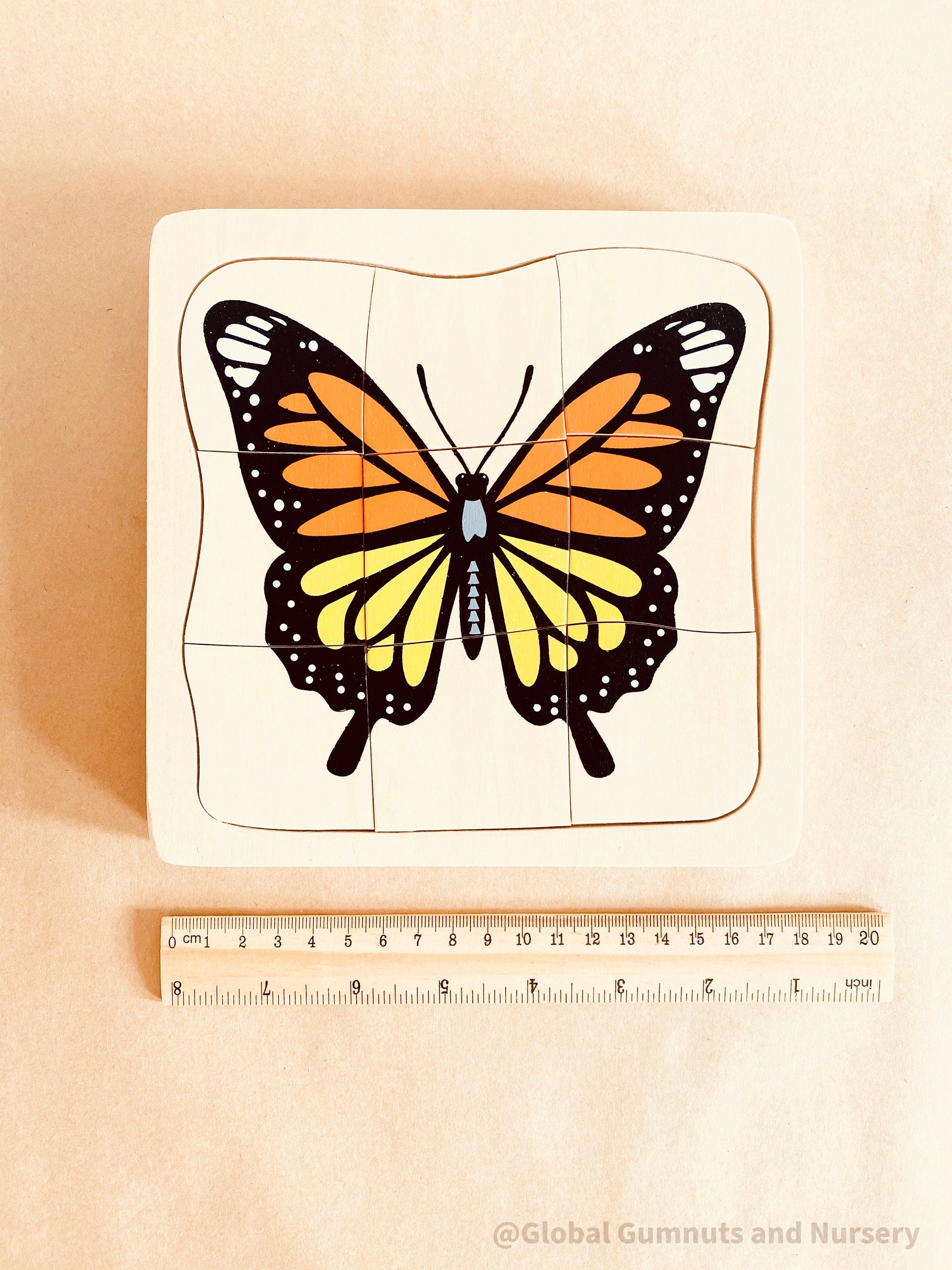Butterfly life cycle puzzle, Montessori-inspired and crafted as a square educational toy. Perfect for learning and play.