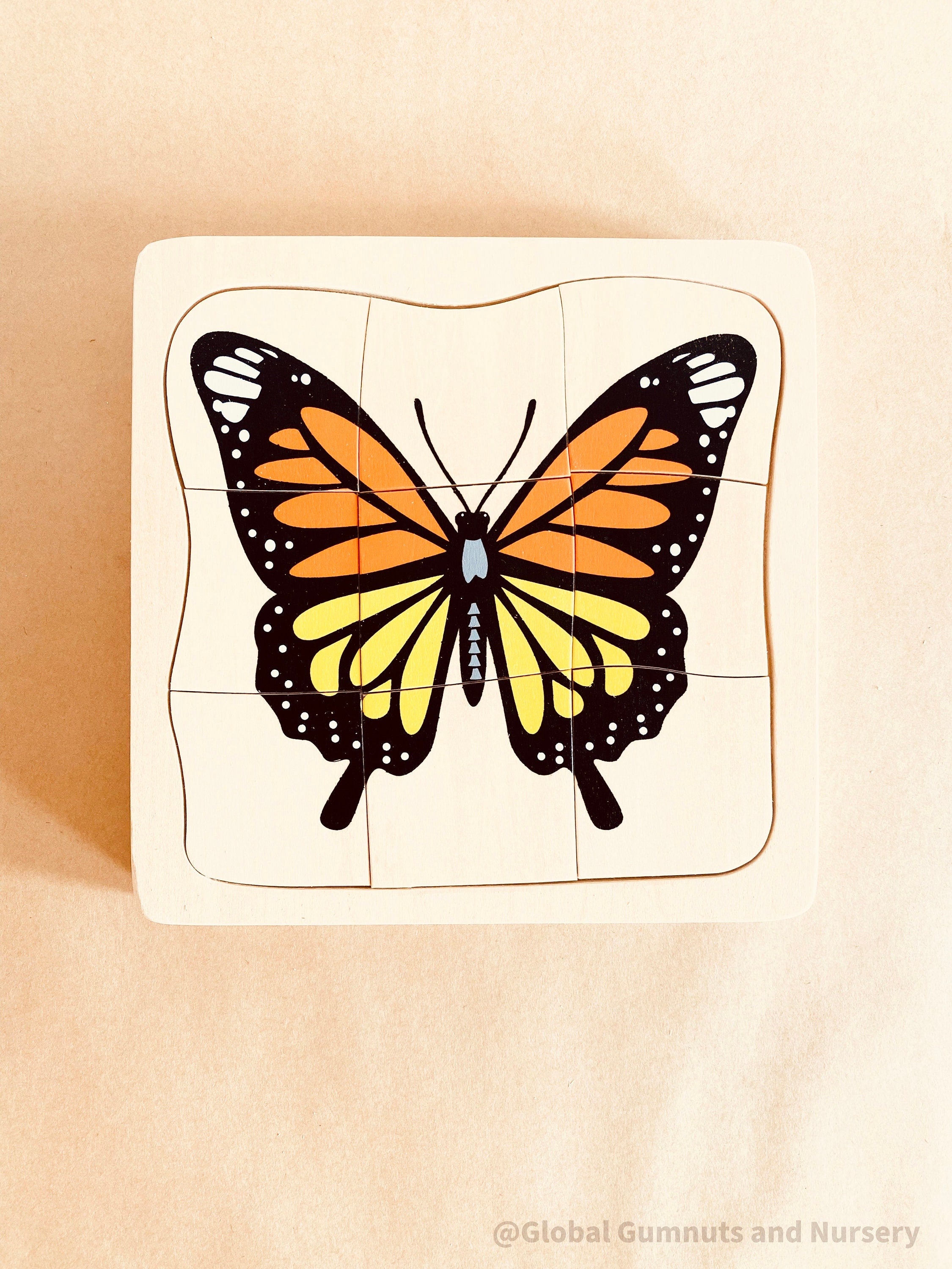 Butterfly life cycle puzzle, Montessori-inspired and crafted as a square educational toy. Perfect for learning and play.