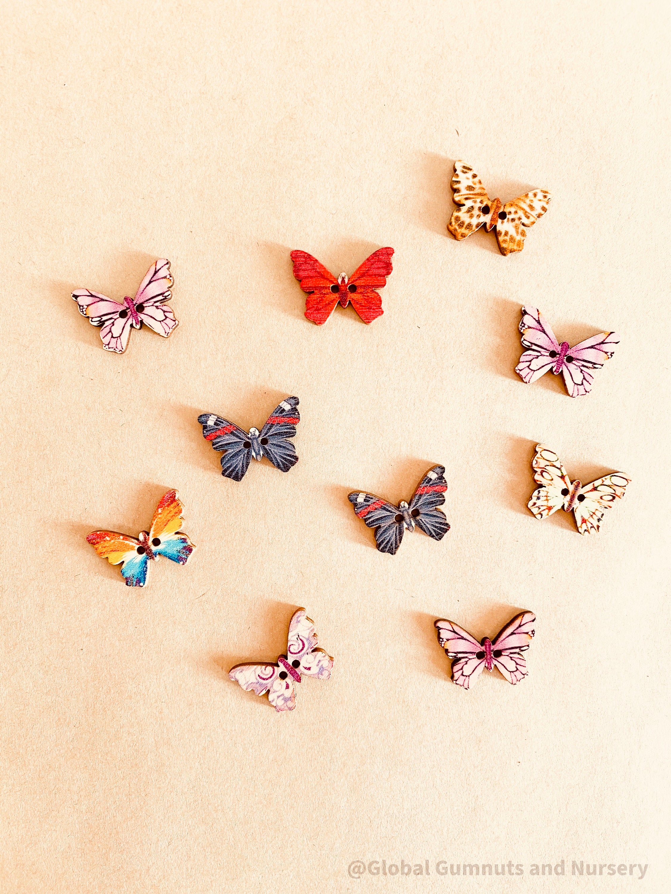 Set of 10 or 20 colorful wooden butterflies, perfect for crafts, decorations, or vibrant small-world play.