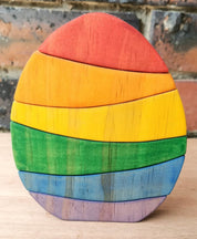 Rainbow Egg Wooden Stacker: Colourful egg-shaped stacker toy.