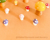 Colourful Resin Mushrooms: Vibrant resin mushroom set for fairy gardens or plant decor.