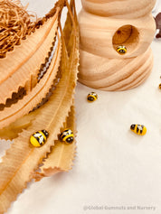 Mini Wooden Bees: Small wooden bee figurines for creative play.